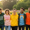 Diverse group of individuals wearing inspirational apparel outdoors, showcasing motivational t-shirts and affirmation hoodies