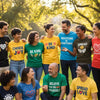 Diverse group wearing motivational t-shirts in a sunny park, embodying positivity and gratitude