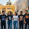 Diverse group wearing unique graphic tees in Melbourne, showcasing creative expression and local culture