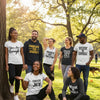 Diverse individuals in affirmation clothing outdoors, showcasing empowerment and self-expression