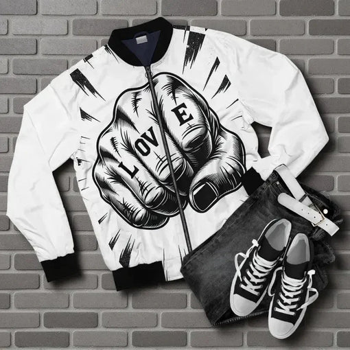 White bomber jacket with a fist graphic and the word "LOVE," paired with jeans and sneakers.