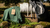 Eco-friendly streetwear items made from organic and recycled materials in a natural setting