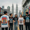 Young people in Kuala Lumpur wearing graphic tees inspired by the Petronas Twin Towers, showcasing vibrant streetwear culture