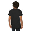Man wearing plain black t-shirt and dark jeans, back view, casual clothing style