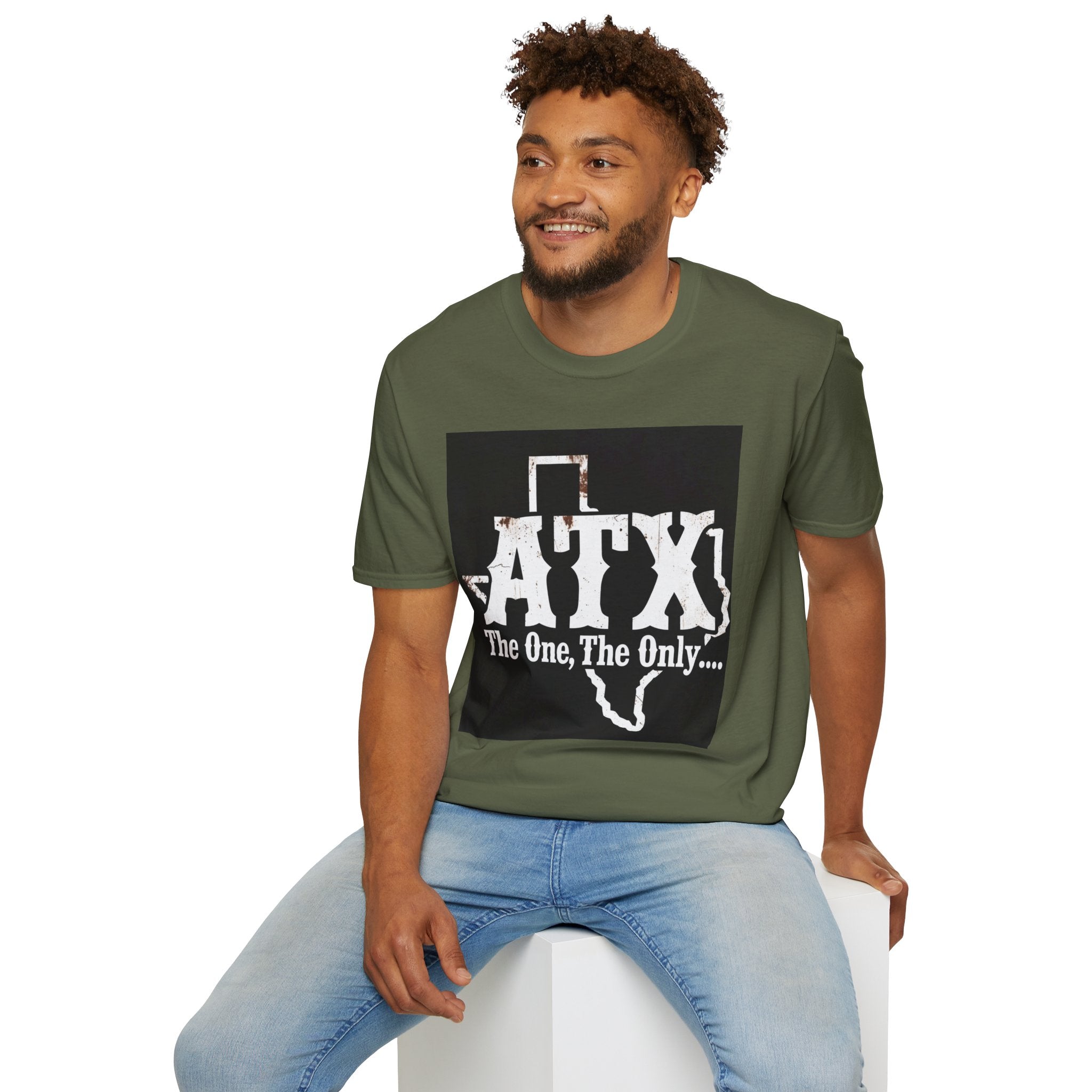 Man wearing olive green ATX graphic t-shirt with Texas outline, casual fashion