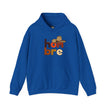 Blue hoodie with colorful 'hombre' text and cowboy hat graphic on front