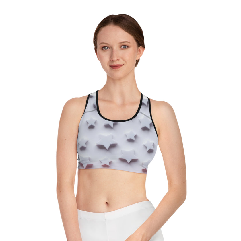 Woman wearing a star pattern sports bra, activewear for mindful living, white background