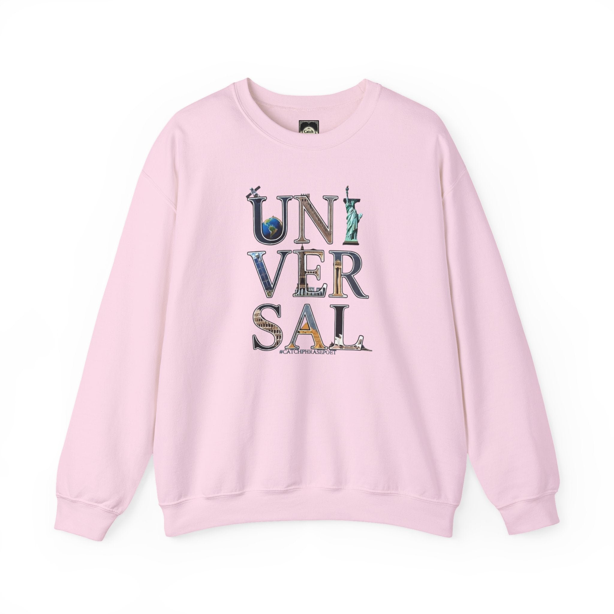 Light pink sweatshirt with 'UNIVERSAL' graphic, world landmarks in letters, laid flat.