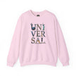 Light pink sweatshirt with 'UNIVERSAL' graphic, world landmarks in letters, laid flat.