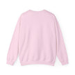 Back view of a plain light pink crewneck sweatshirt with long sleeves.