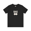 'Get Your Bag — It's Over There' arrow graphic tee, front view — Catch Phrase Poet
