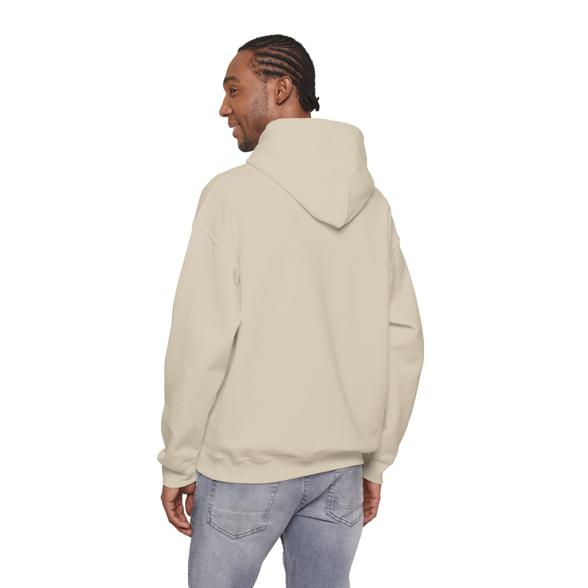 Man wearing a beige hooded sweatshirt and light blue jeans, back view