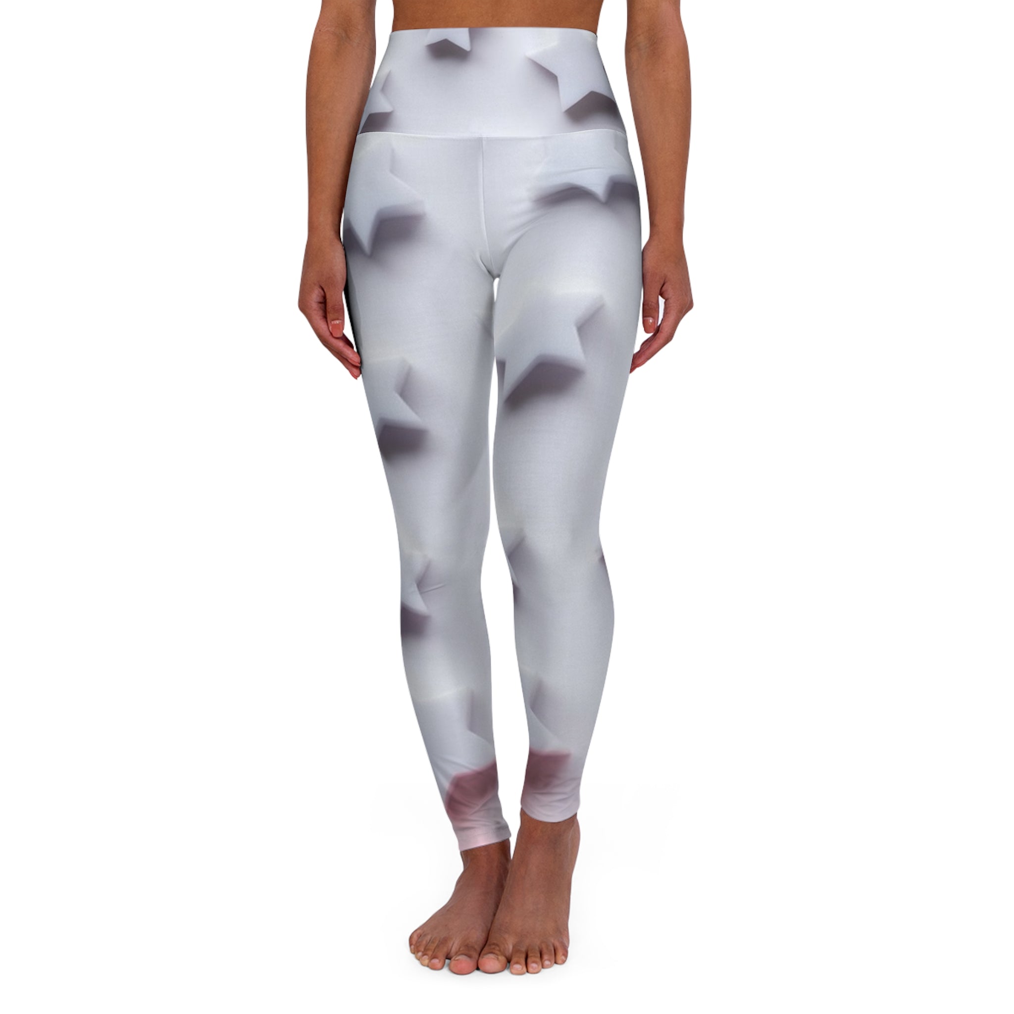 Woman wearing white high-waisted leggings with 3D geometric star pattern