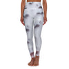 Woman wearing white high-waisted leggings with 3D geometric star pattern