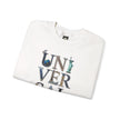 Folded white graphic sweatshirt with 'UNIVERSAL' text featuring travel-themed icons