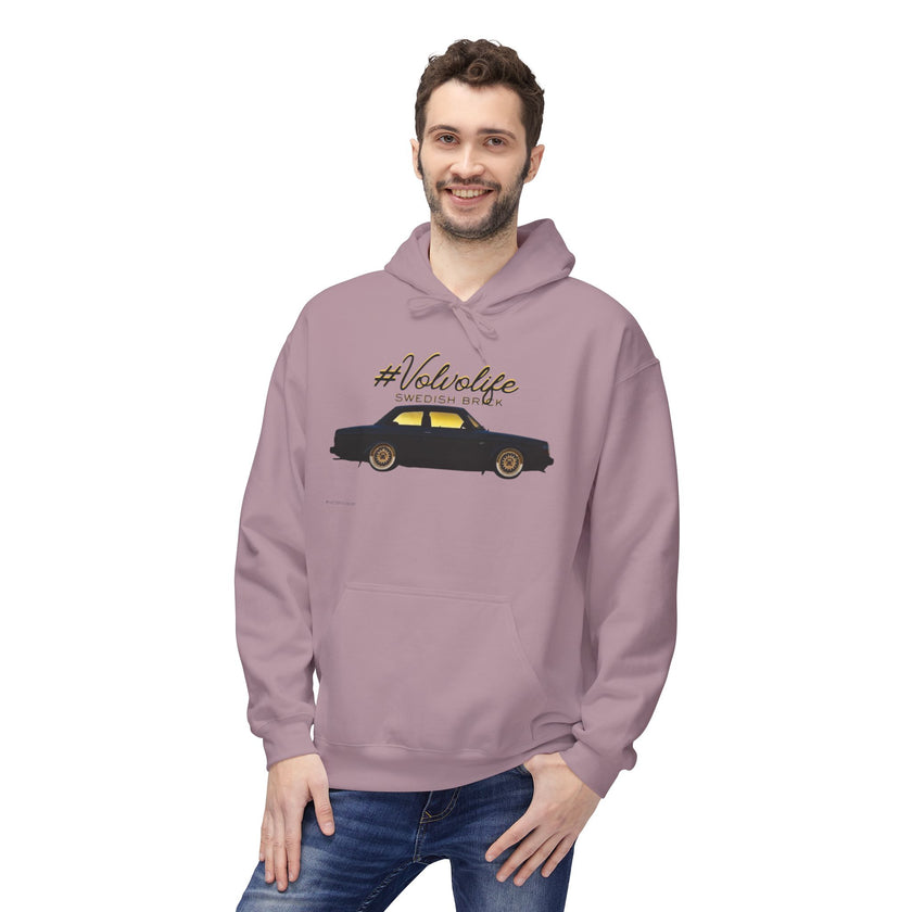 Man wearing mauve hoodie with #Volvolife Swedish Brick car graphic, casual fashion style