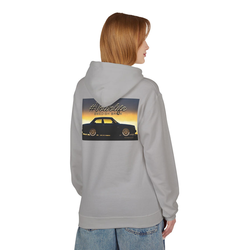 Person wearing light gray hoodie with vintage car graphic and #Volvolife Swedish Brök text on back