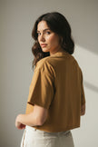 Brown t-shirt on a white background