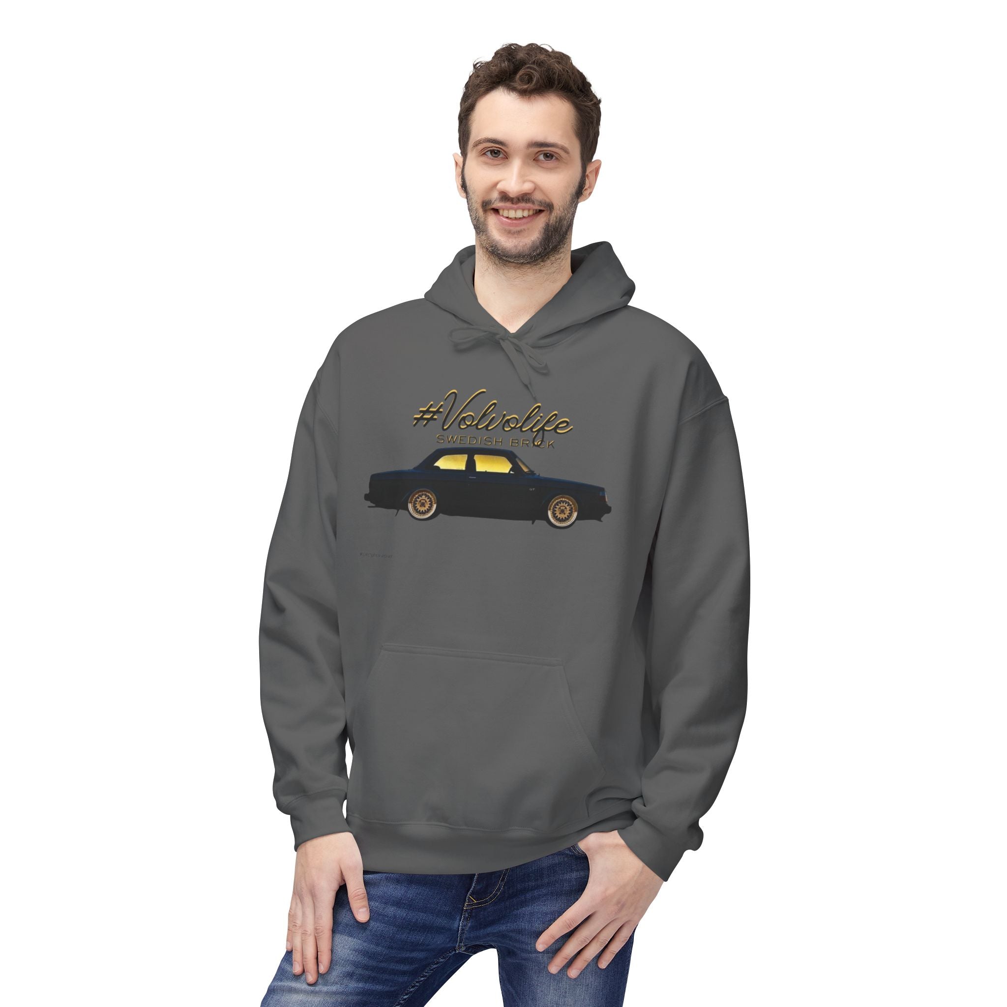 Man in gray hoodie with hashtag Volvolife Swedish brick and black car graphic