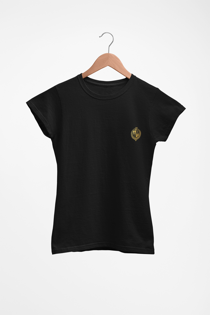 Black t-shirt with small gold crest logo on chest, displayed on wooden hanger