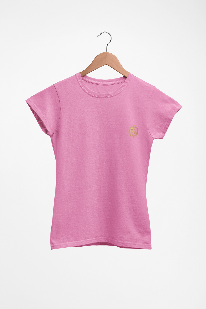 Pink women's crew neck t-shirt with small gold emblem on left chest, displayed on hanger
