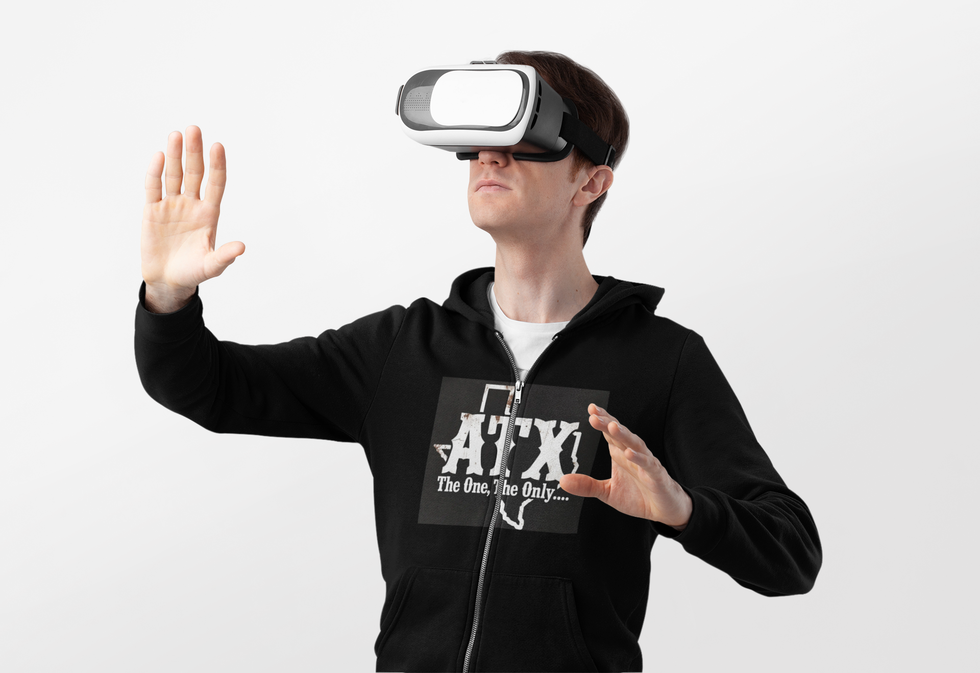 Man wearing virtual reality headset in black ATX zip hoodie on white background