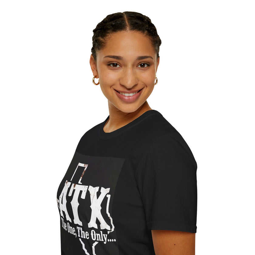 Smiling woman wearing a black graphic ATX t-shirt with white letters on a white background