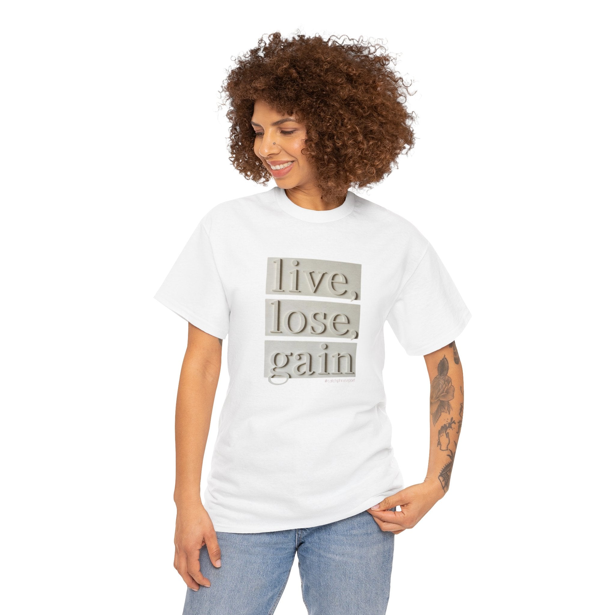 Woman wearing white t-shirt with 'live, lose, gain' affirmation graphic, casual style