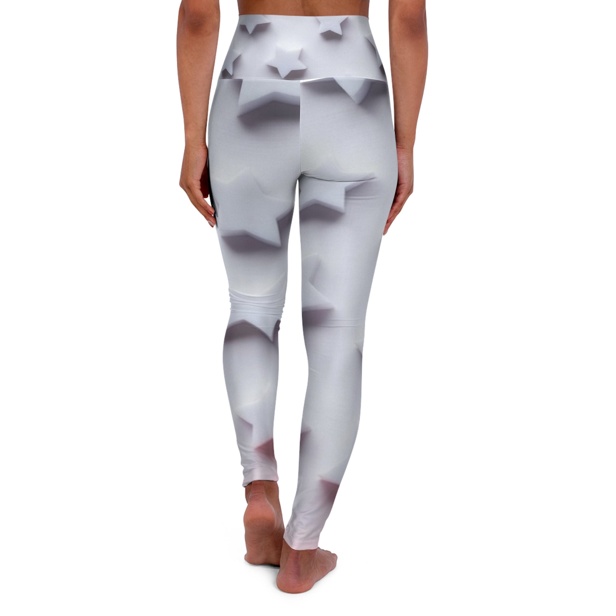 Woman wearing high-waisted white leggings with 3D star pattern, back view
