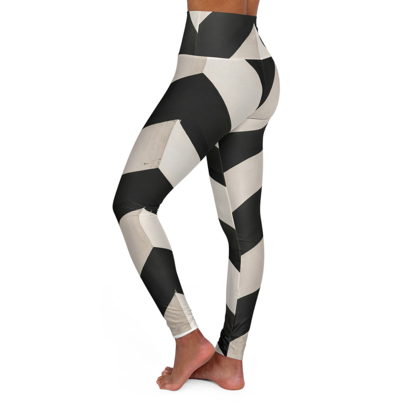 High-waisted leggings with bold black and white geometric pattern, side view