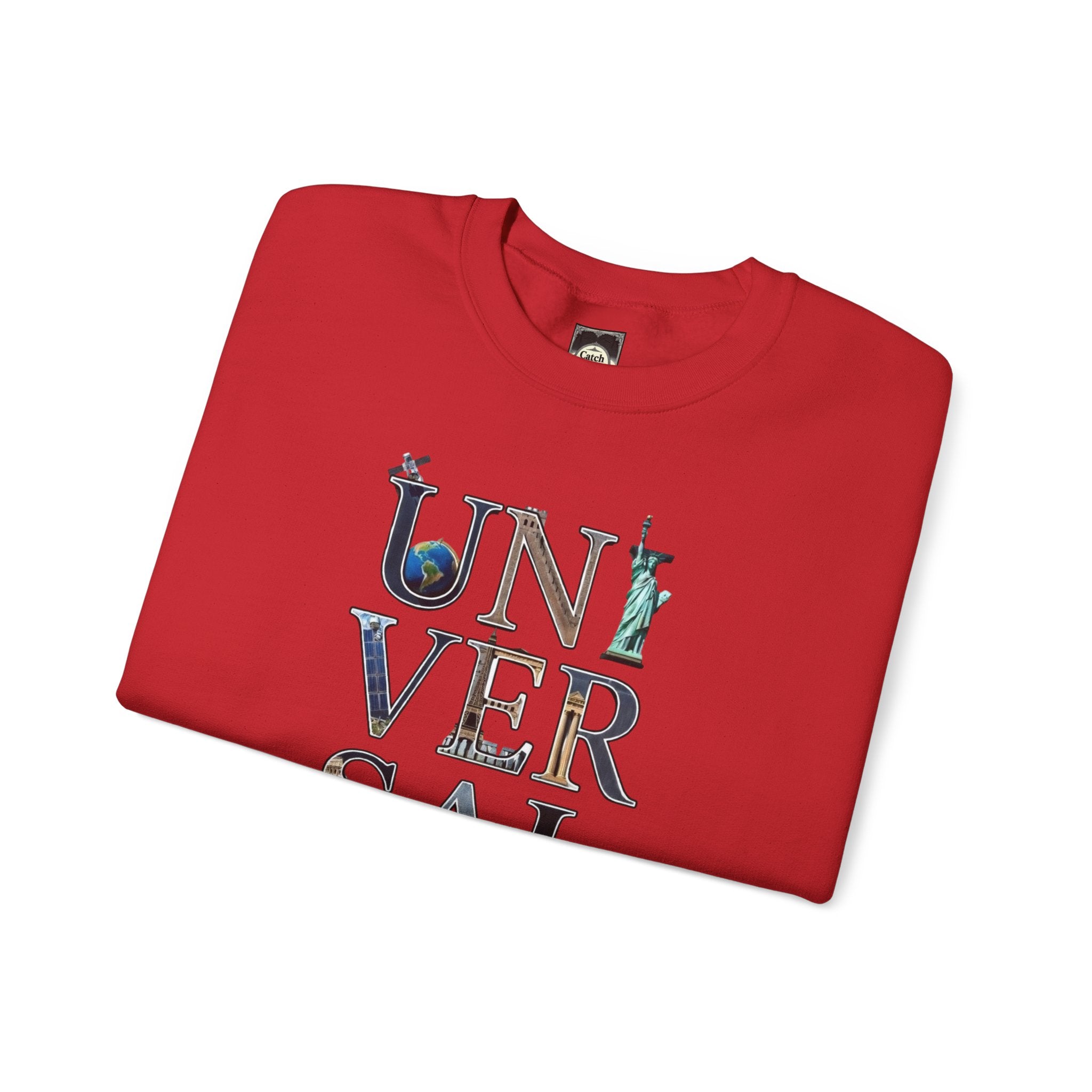 Red graphic tee with 'UNIVERSAL' text and global landmark icons, folded flat