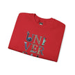 Red graphic tee with 'UNIVERSAL' text and global landmark icons, folded flat