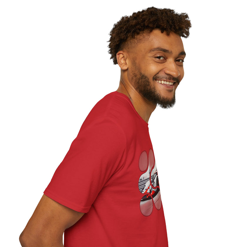 Man wearing a red graphic t-shirt with a creative circular design, smiling, side view