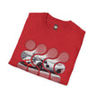 Red graphic t-shirt with abstract pattern and sports car print, folded neatly