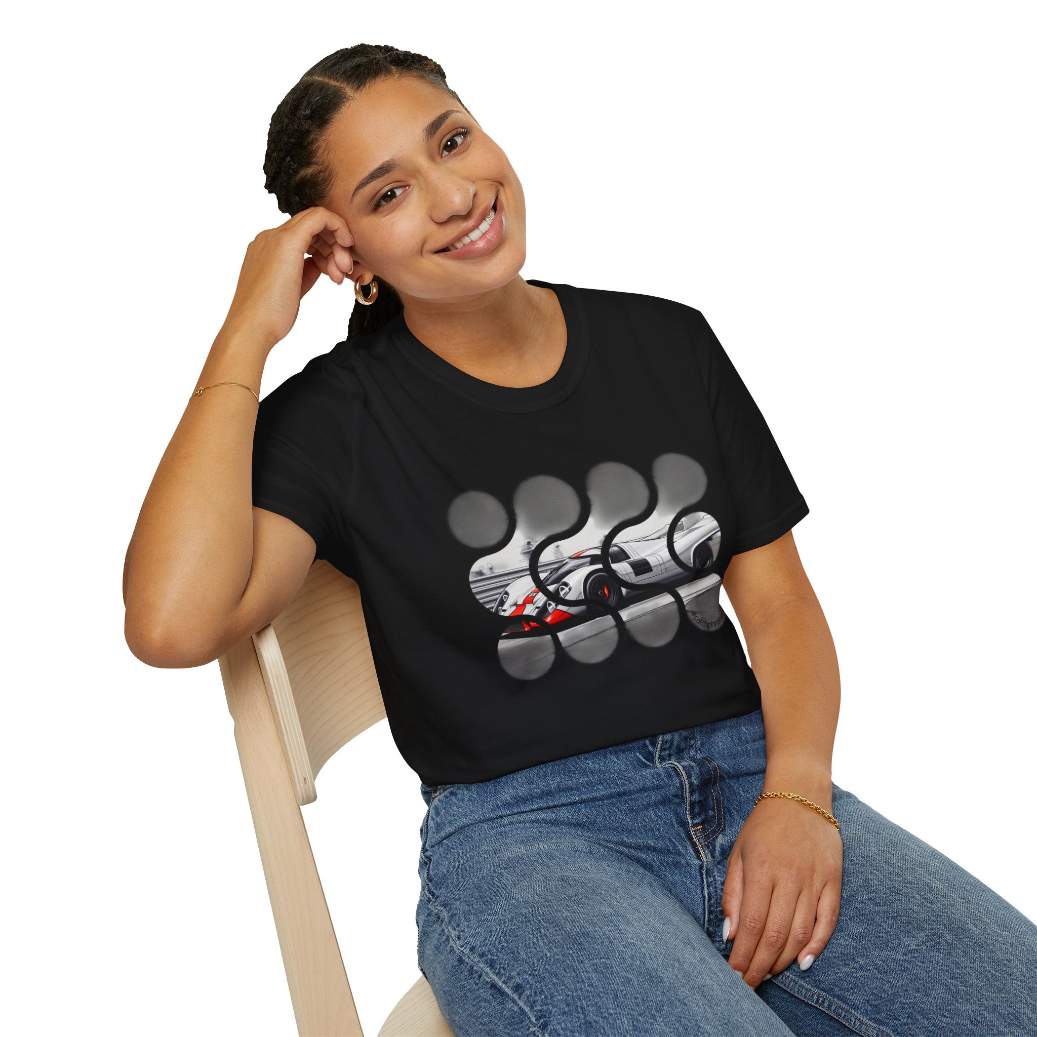 Smiling woman in black graphic tee with abstract car design, casual and modern fashion
