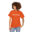 Woman in orange t-shirt with 'de-part-men-tal-ized' text, casual clothing style