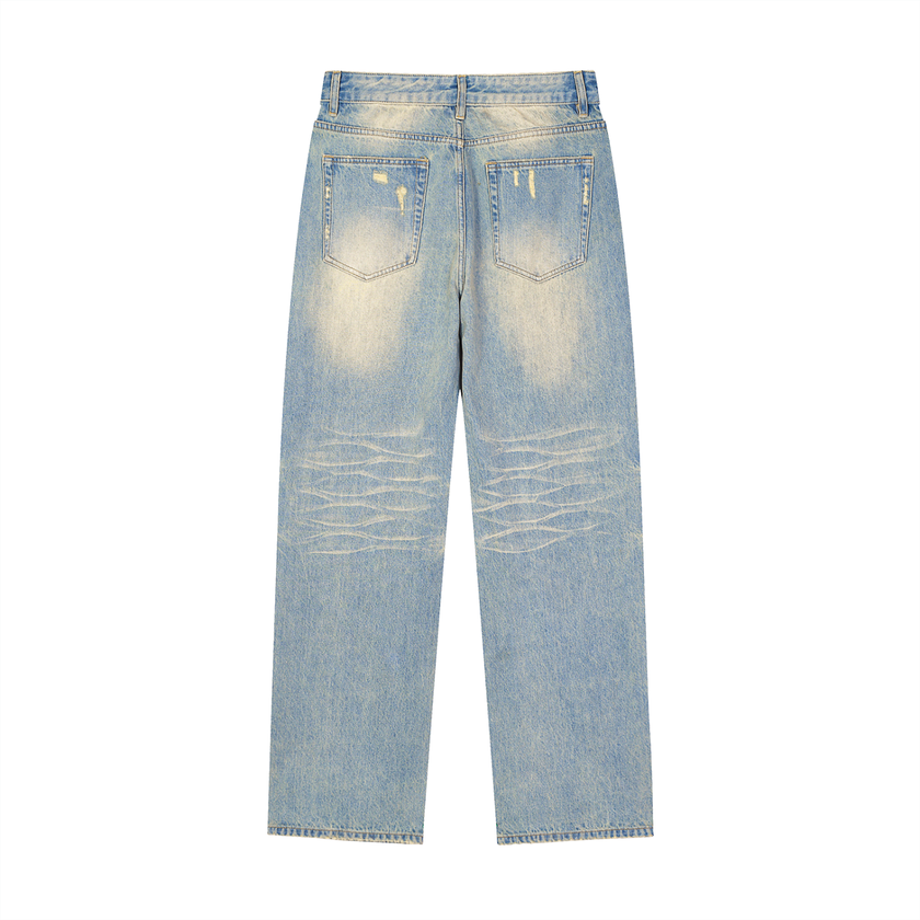 Vintage-wash light blue raw hem jeans showing faded thighs and lived-in pocket detail — Catch Phrase Poet