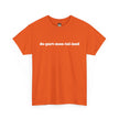 Orange t-shirt with 'de-part-men-tal-ized' text in bold white font, laid flat.