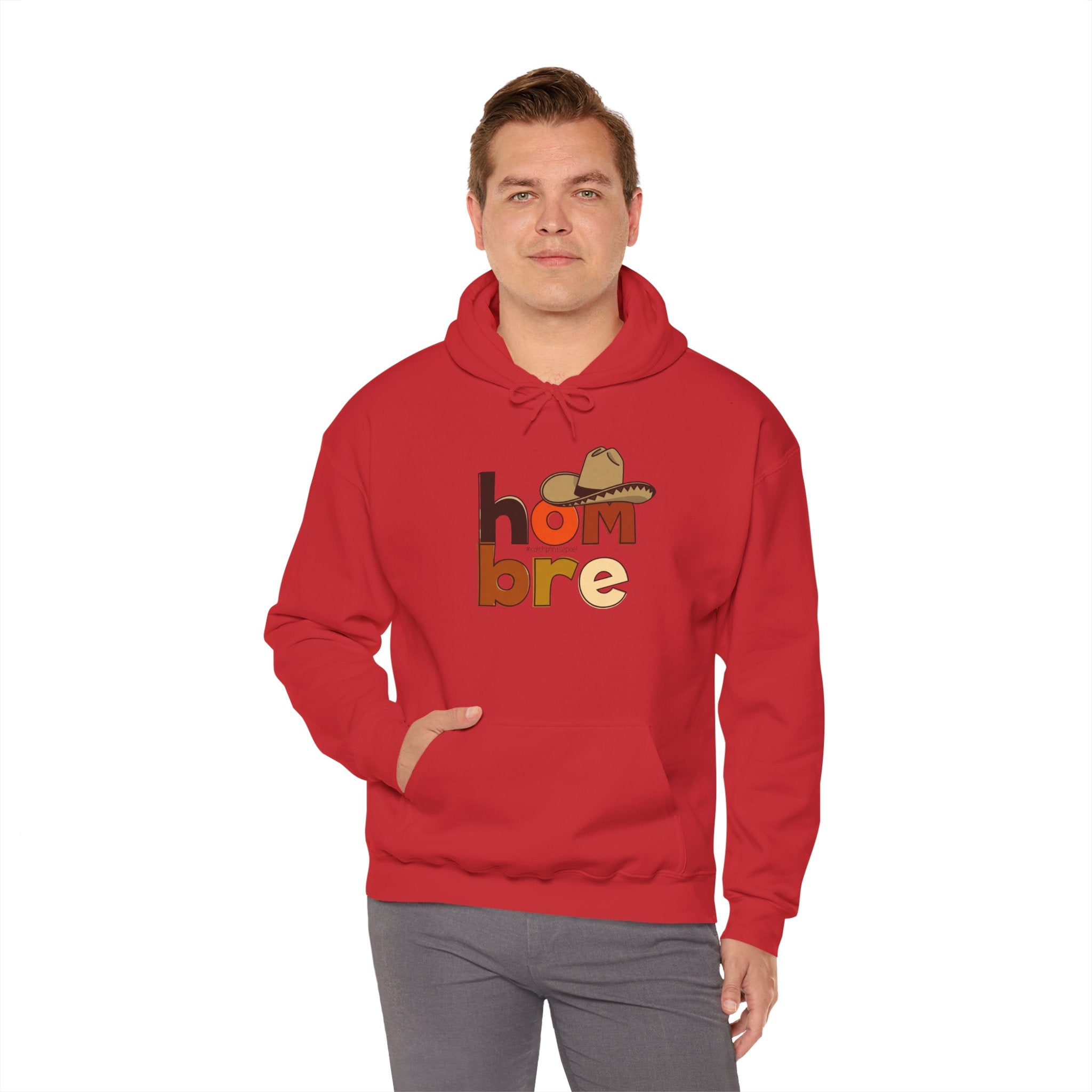 Man wearing red hoodie with 'hombre' text and sombrero graphic, casual fashion