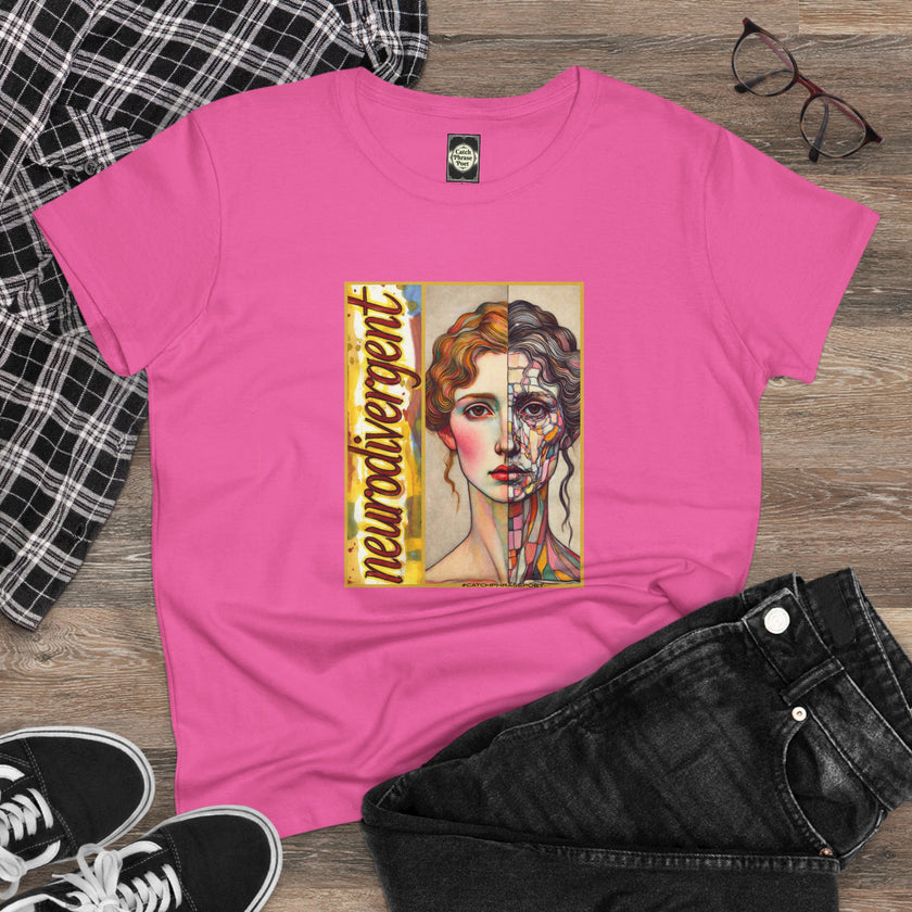 Pink t-shirt with artistic neurodivergent graphic, woman's half-portrait, laid on wood