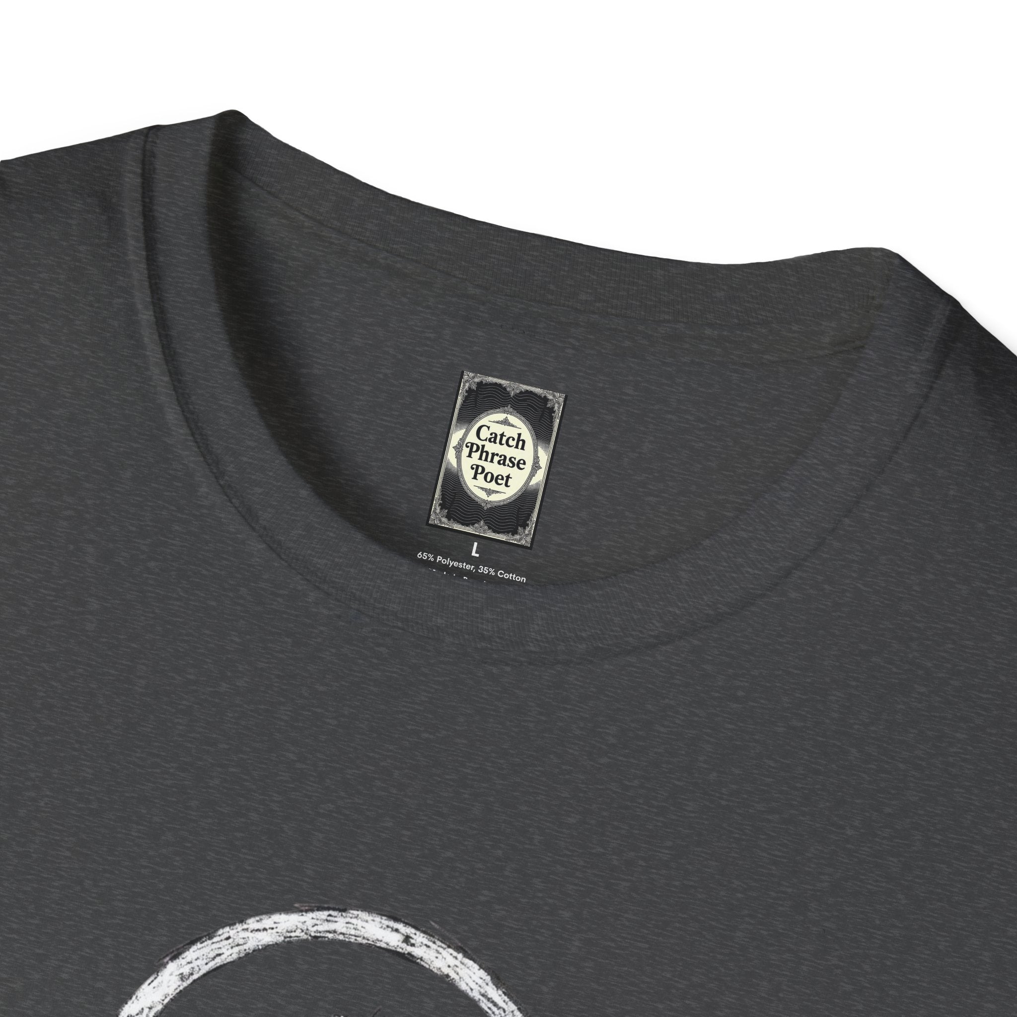 Close-up of a dark heather t-shirt collar with Catch Phrase Poet label and white graphic print