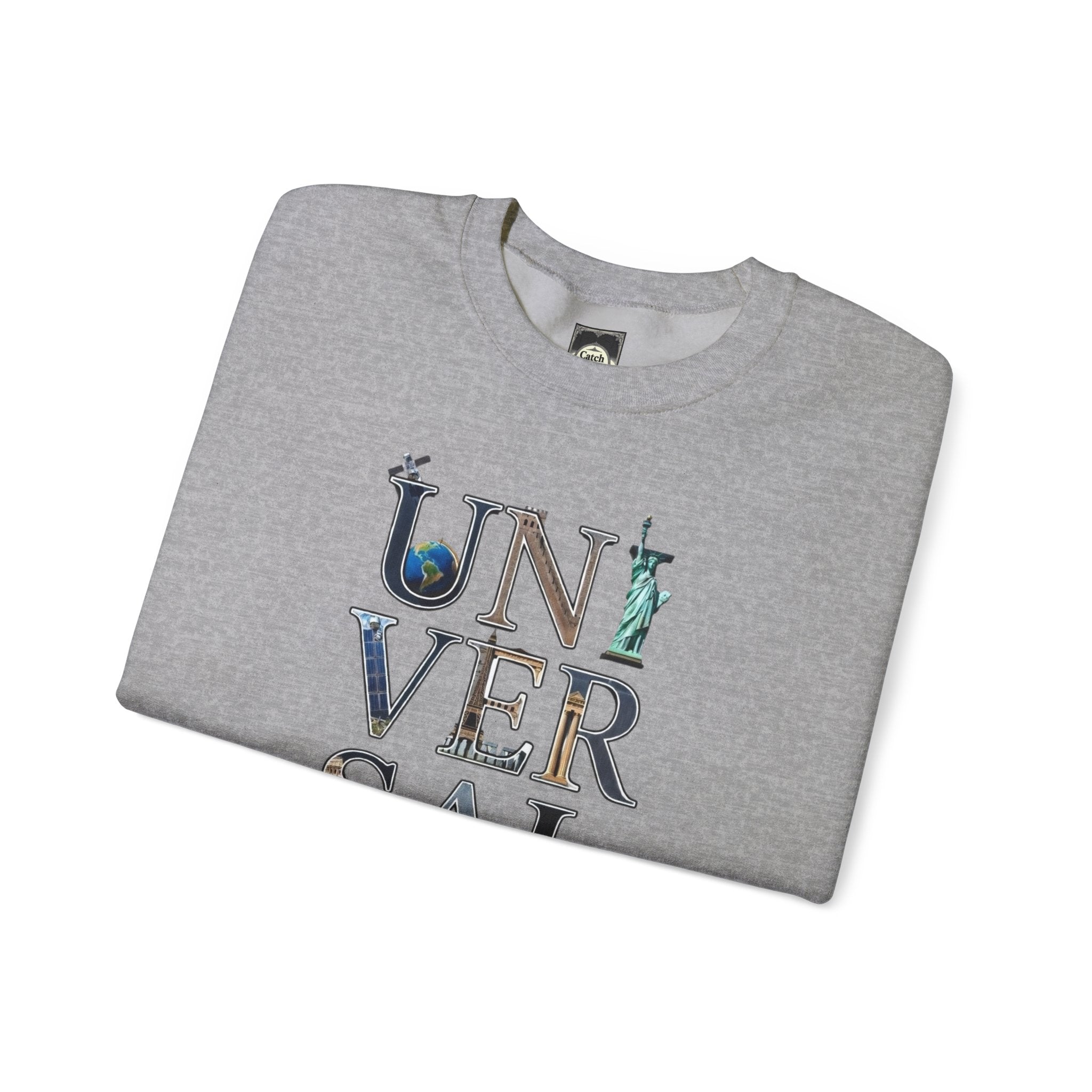 Folded grey crewneck shirt with 'UNIVERSAL' graphic and global landmarks on letters