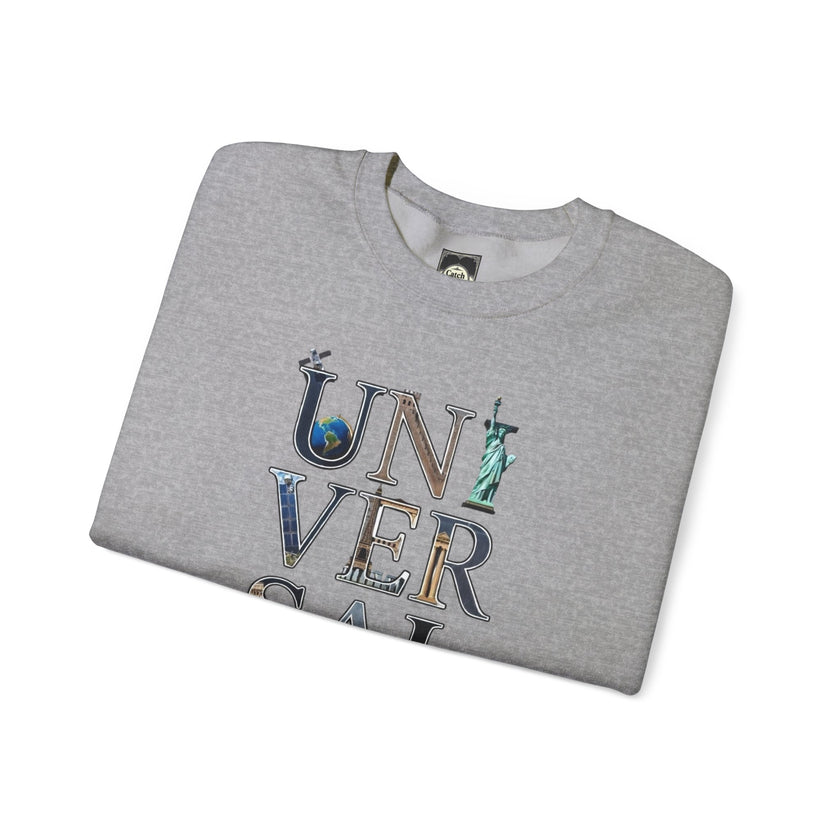 Folded grey crewneck shirt with 'UNIVERSAL' graphic and global landmarks on letters
