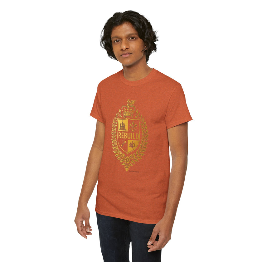 Person wearing an orange t-shirt with a gold crest design and the word 'REBUILD' on front