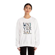 Woman wearing a white sweatshirt with 'UNIVERSAL' and landmarks graphic on front
