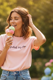 A light pink short-sleeve crewneck t-shirt with 'Lipstick Hipster' printed in black cursive across the chest, displayed on a clean white background.