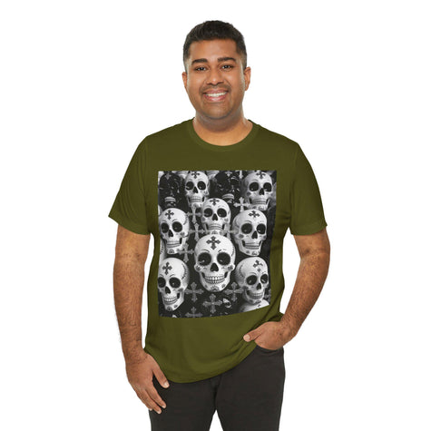 Man wearing olive green graphic t-shirt with black and white skull pattern design
