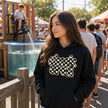 Retro checkered essential hoodie worn, oversized streetwear fit — Catch Phrase Poet