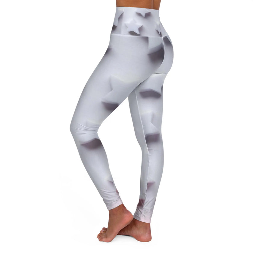 White high-waisted leggings with subtle 3D star pattern, model standing barefoot