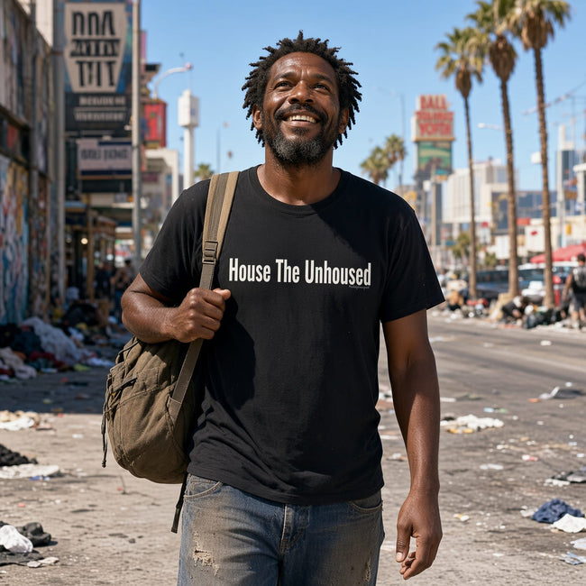 Woman wearing House the Unhoused statement t-shirt